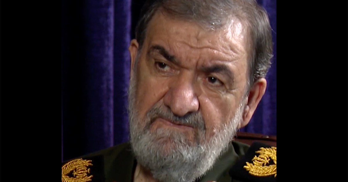 Mohsen Rezaei in military uniform during Al Jazeera interview window — still from Sep 20 Iran war-end conditions explainer
